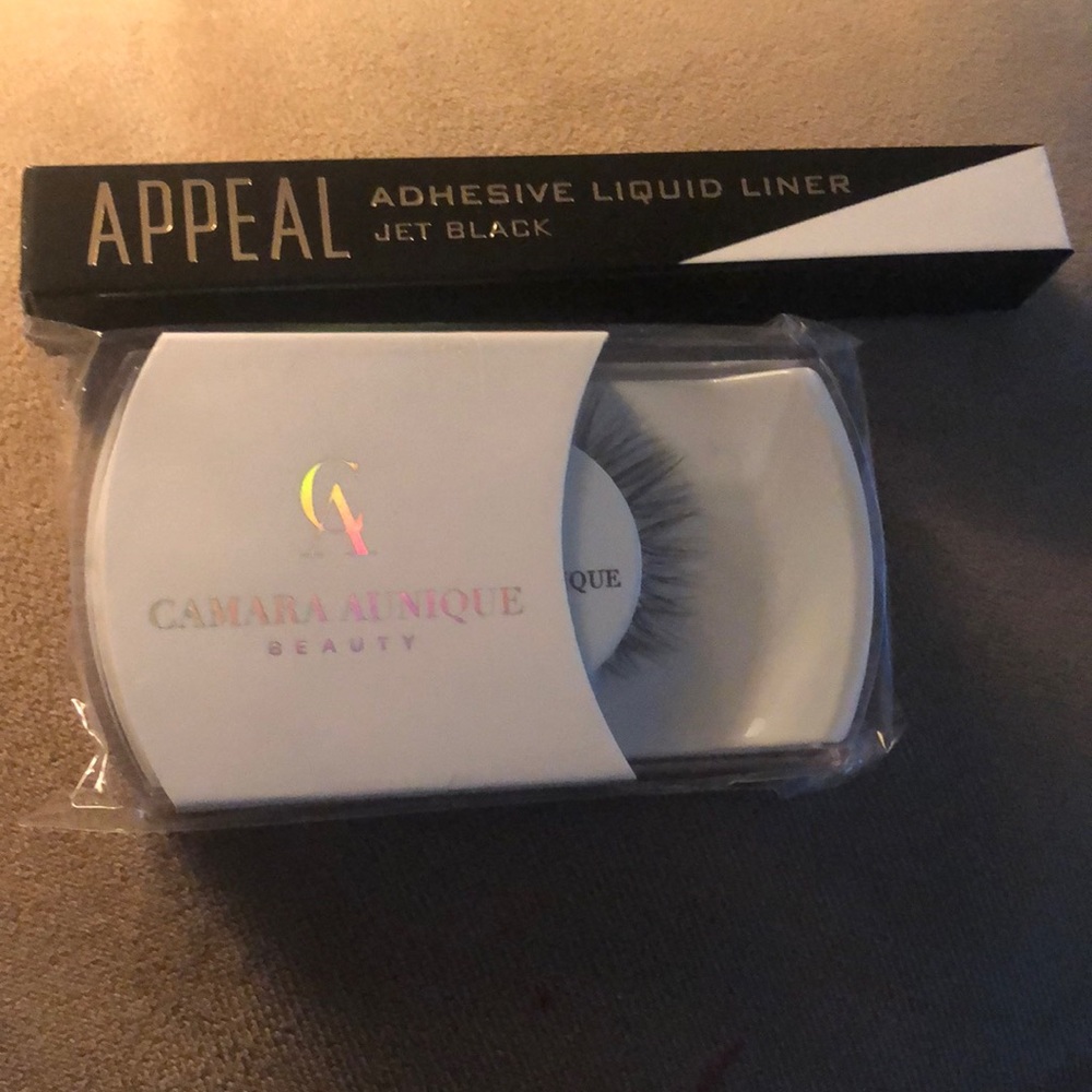 Never opened faux eye lashes and eye liner